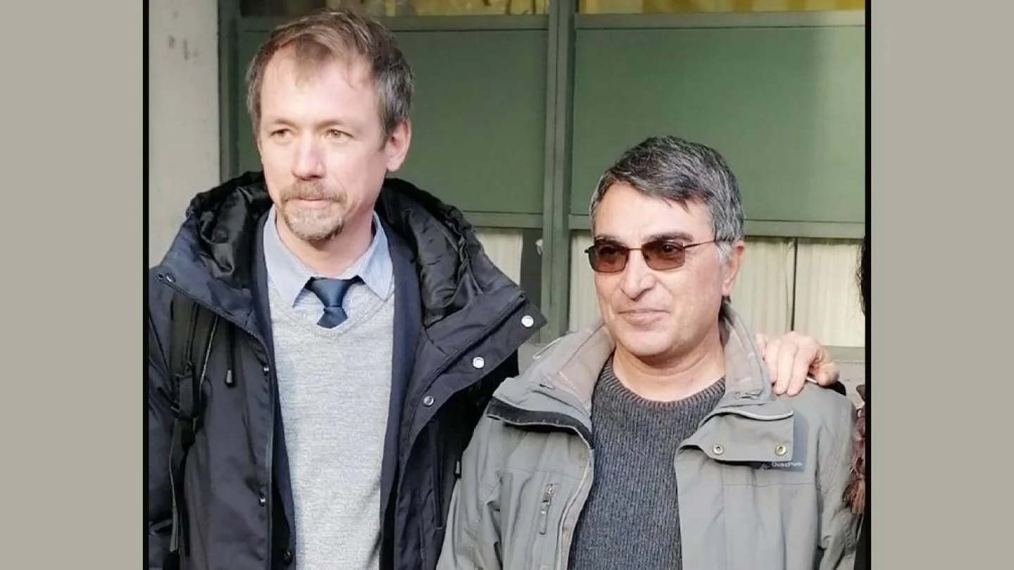 Fotoğrafta avukat René Bahns ile Mustafa T. görülüyor 