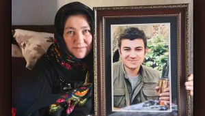 Bir avuç küle de razı