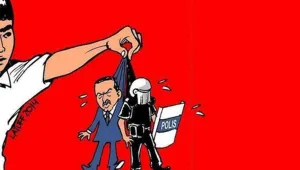 Karikatür paylaşmaya dava
