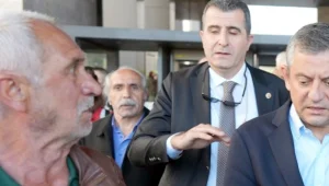 Sırrı’nın töreninde Özel’e yumruk