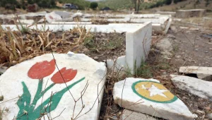 144 mezar balyozla parçalandı
