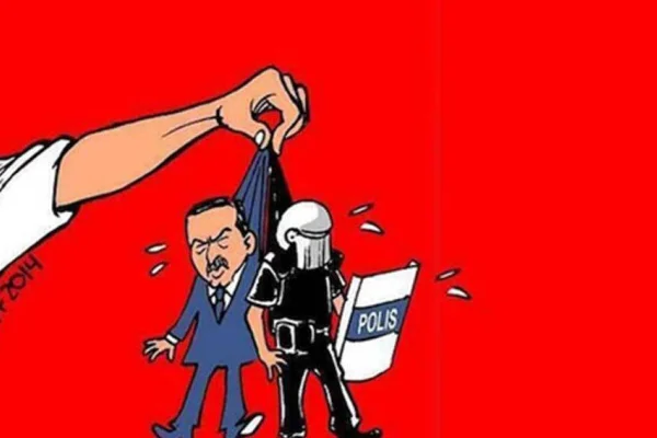 Karikatür paylaşmaya dava