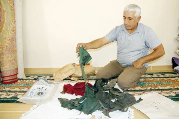 8 yıl sonra yakılmış giysileri verildi