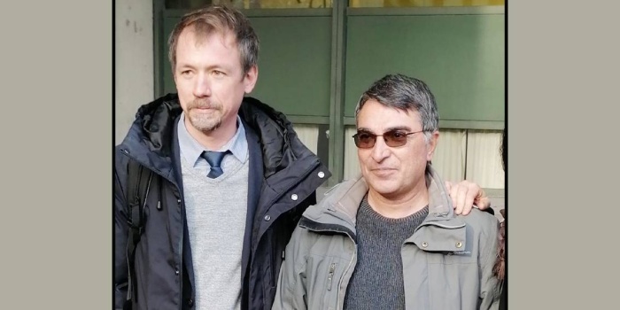 Fotoğrafta avukat René Bahns ile Mustafa T. görülüyor 