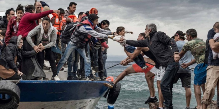 İtalya sahillerine ulaşan göçmenler Foto: Jim Forest